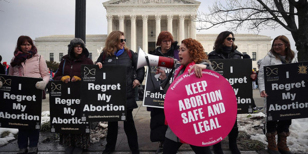 Protesters on both sides of the abortion issue gather in front of the U.S. Supreme Court building during the Right To Life March in Washington D.C., Jan. 18, 2019. (Mark Wilson/Getty Images)