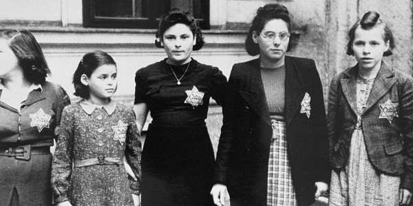 A group of Jewish girls wearing the yellow star. —United States Holocaust Memorial Museum, courtesy of Oesterreichische Nationalbibliothek.